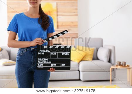 Assistant Holding Clapboard On Film Set, Closeup. Space For Text