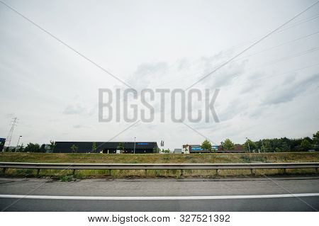 Moorsele Wevelgem, Belgium - Jul 14, 2011: Wide Angle View Of Factory Building Of Delta Light Led An