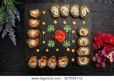 Hotto Set Of Sushi Rolls On Black Stone