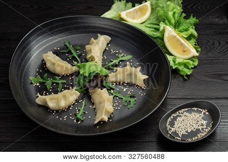 Gedza Syumai Steamed Chinese Dumplings With Shrimp And Vegetables, Served With Sauce