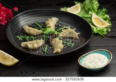 Gedza Syumai Steamed Chinese Dumplings With Shrimp And Vegetables, Served With Sauce