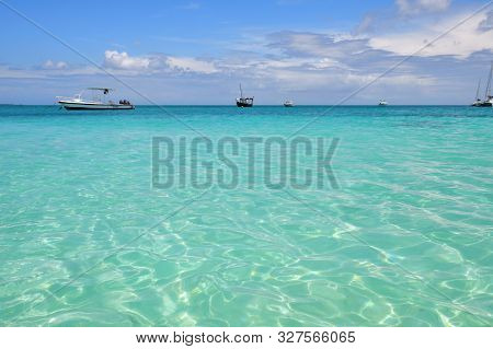 Blue Transparent Water And Boats Moored On Indian Ocean, Kendwa Beach, Zanzibar,tanzania, Africa.
Fo