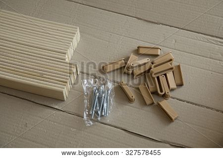 Furniture Assembly Parts And Tools For Self Assembly Furniture, On The Floor.