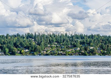 Billowing Clouds Hover Over Mercer Island In Washington State.