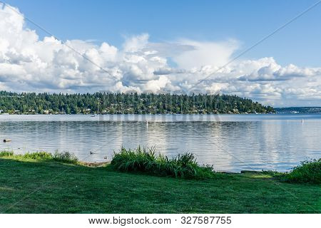 Billowing Clouds Hover Over Mercer Island In Washington State.
