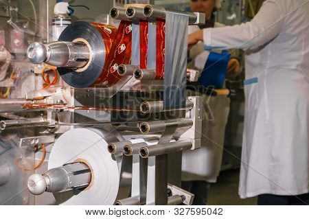 Perm, Russia - October 08, 2019: Packaging Equipment Of The Permskaya Confectionery Factory In Actio