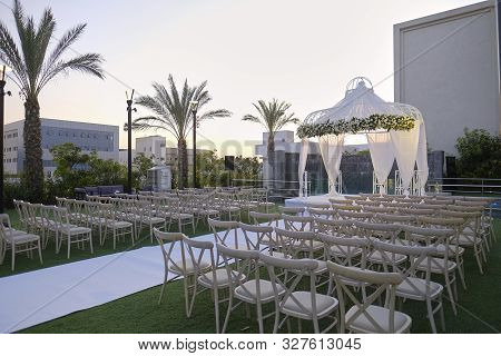 Beautiful Photo Of The Jewish Hupa , Wedding Putdoor .two Glasses And Bottle Of Wine And Glass It Is