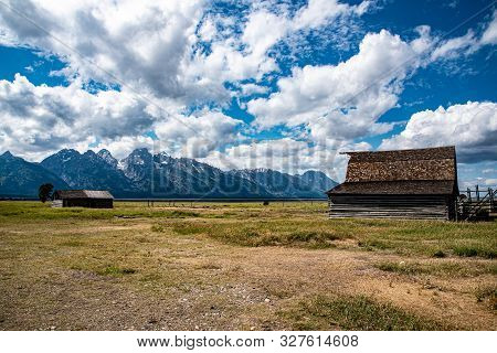 Mormon Home And Barn By The Mountain