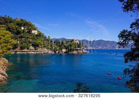 The Sand Beach Known As Paraggi Near Portofino In Genoa On A Blue Sky And Sea Background