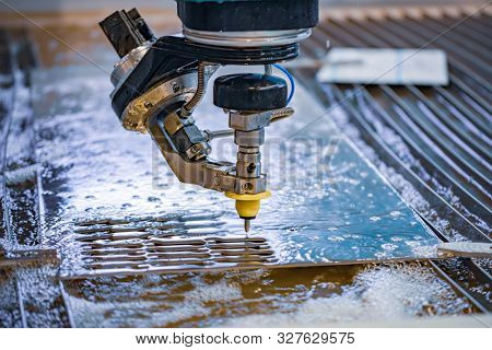 CNC water jet cutting machine modern industrial technology.