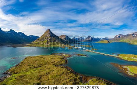 Fredvang Bridges Panorama. Lofoten islands is an archipelago in the county of Nordland, Norway. Is known for a distinctive scenery with dramatic mountains and peaks, open sea and sheltered bays.