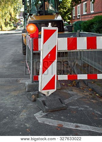 Construction Site Shut-off With Warning Bar And Construction Site Warning Light.