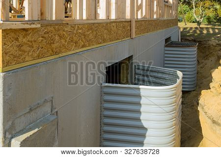 New House Under Construction Process Of Installing Window Well Basement Stick Built Frame
