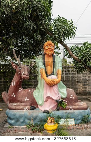 Bang Saen, Thailand - March 16, 2019: Wang Saensuk Buddhist Monastery. Colorful Statue Of Pra Pin Ta