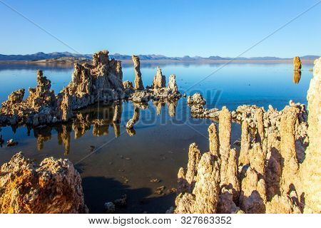 Evening sunset. Picturesque Mono lake. California. The columns - remains of 