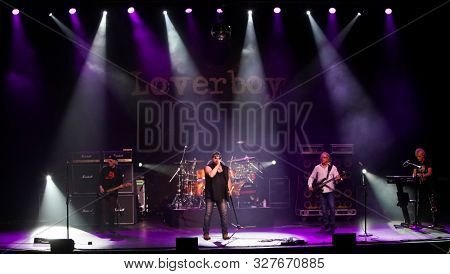 HUNTINGTON - OCT 10: (L-R) Paul Dean, Mike Reno, Matt Frenette, Ken Sinnaveve and Doug Johnson of Loverboy perform in concert at the Paramount on October 10, 2019 in Huntington, New York.