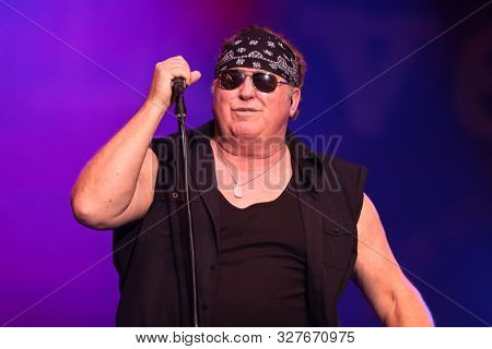 HUNTINGTON - OCT 10: Mike Reno of Loverboy performs in concert at the Paramount on October 10, 2019 in Huntington, New York.