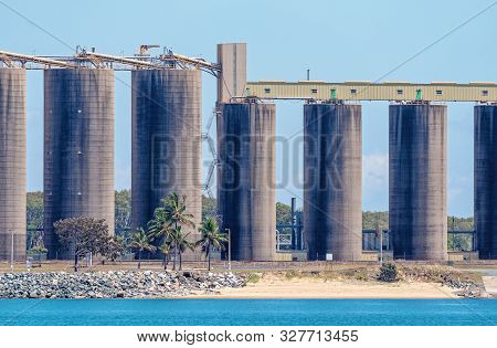 Storage Silos At An Australian Harbour Wharf Where Sugar And Grain Are Exported Around The World