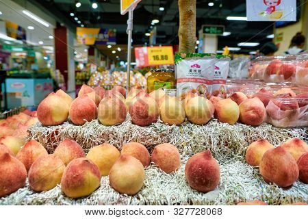 SHENZHEN, CHINA - CIRCA APRIL, 2019: peaches on display at JUSCO store in Shenzhen.