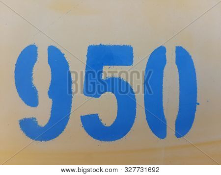 Number Nine Hundred And Fifty, The Number Is Printed On The Yellow Wall Using A Stencil, Number 950