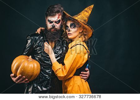 Fashion Glamour Halloween. Halloween Sale And Shopping. Portrait Of Happy Young Couple In Halloween 