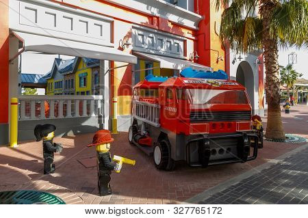 Dubai, Uae, January 09, 2019: Fire Department With Firefighters And Fire Engine Made Of Lego Bricks 