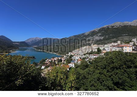 Barrea, Italy - 12 October 2019: Lake Barrea And The Mountain Village