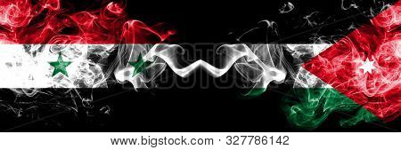 Syria Vs Jordan, Jordanian Smoke Flags Placed Side By Side. Thick Colored Silky Smoke Flags Of Syria