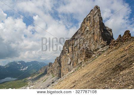 Close-up Barglen Mountain And Near Melchsee-frutt In Summer, Cloudy Blue Sky