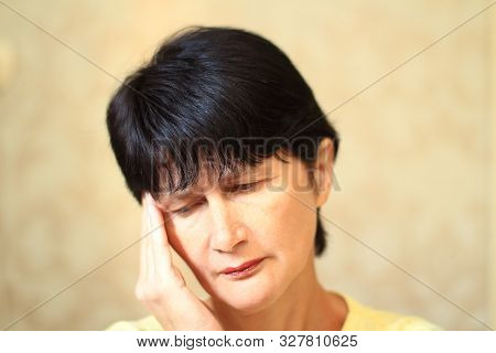 Headache And Fatigue. Depression And Stress. A Middle Aged Woman