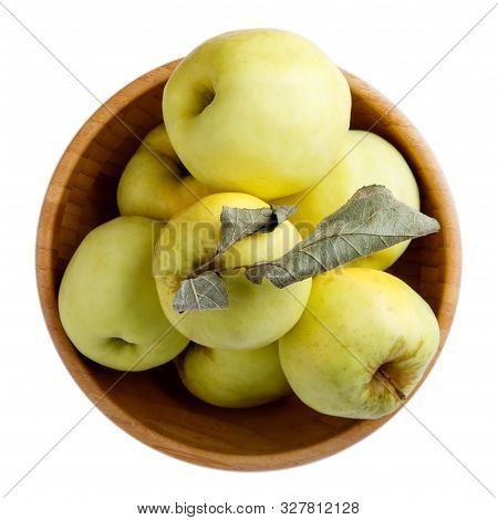 Ripe  Yellow Apples In Wooden Bowl Isolated On White Background. Antonovka Apples. Top View, Close-u