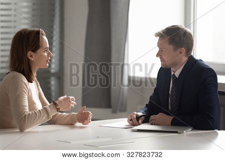 Recruiter Hr Manager Listening To Female Candidate At Job Interview