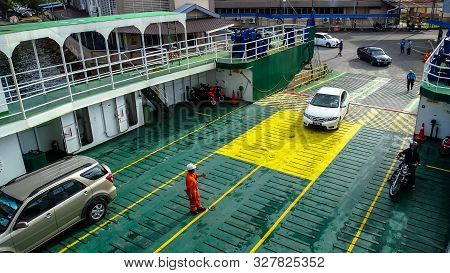 Labuan,malaysia-may 31,2019:worker On Duty At Docking On The Ro-ro Passenger Ship In Labuan,malaysia