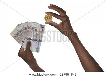 African woman hands holding a stack of bitcoins and  pula African currency