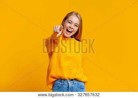 Ha Ha Ha, Loser. Teen Girl Laughing And Mocking On Somebody, Pointing Finger At Camera Over Orange B