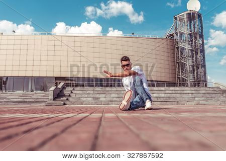 Dancer Dancing Break Dance, Hip Hop. Summer City, Clouds Background. Active Youth Lifestyle Young Ma