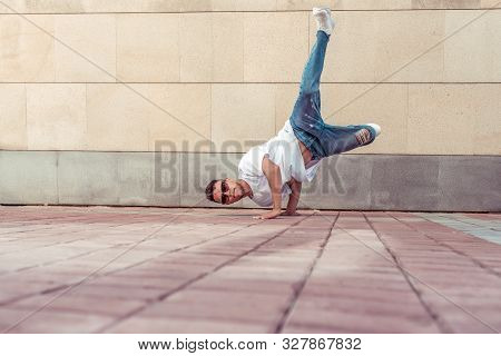 Dancer Acrobat Handstand Dancing Break Dance, Hip Hop. Summer City, Background Wall. Active Youth Li