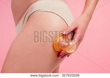 Woman In Beige Panties Massaging Thigh Massage Receiving A Professional Anti Cellulite Cans Jars, Ba
