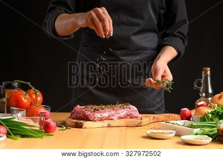 Pork Steak And Green Herbs, Rosemary And Thyme From The Chef In