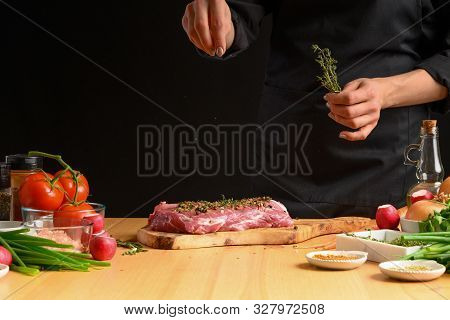 Pork Steak And Green Herbs, Rosemary And Thyme From The Chef In
