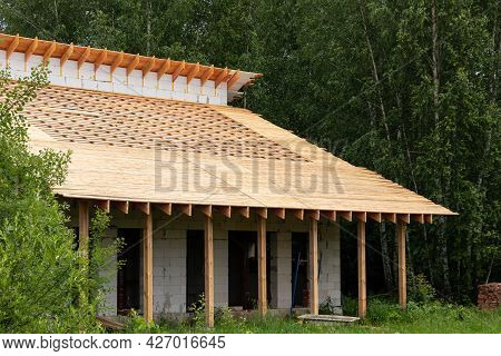 Working Process, Suburban Construction From Silicate And Gas Silicate Blocks And Wood. The Frame Of 