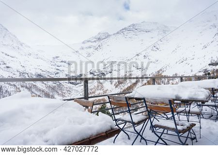 Landscape From The Trainstation Of Alp Grum Along The Way Of The Red Train Of The Bernina During A C