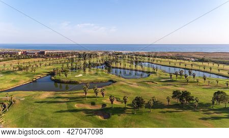 Green Golf Courses By The Sea. Salgados Beach. Portugal, Albufeira. Aerial View.