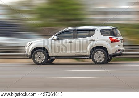 Samut Sakhon, Thailand - April 2021: Isuzu Mu-x, White Car Driving With Speed-effect With Blur Backg