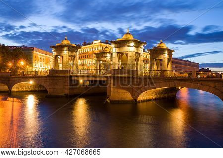 Saint Petersburg, Russia - July 25, 2019: The Ancient Lomonosov Bridge In The Night Illumination On 