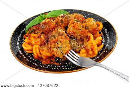 Beef And Pork Meatballs Al Forno With Trulli Pasta In Tomato Sauce Meal Isolated On A White Backgrou