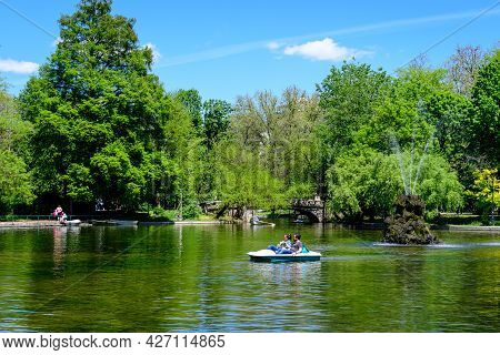 Bucharest, Romania - 9 May 2021: Vivid Green Landscape With Old Large Linden Trees And Green Leaves 