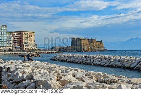 Naples, Italy - January 21, 2017: People Strolling The Lungomare Caracciolo,  Romantic Seaside Prome