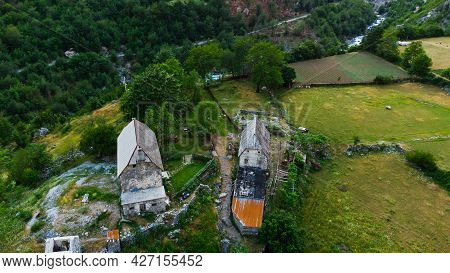 Mountain Landscape With Houses And Farms In Theth In The Albanian Alps