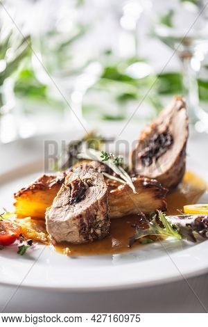Pork Tenderloin Stuffed With Prunes, Reduction From Red Wine With Potato Gratin. Creative Festive Ma